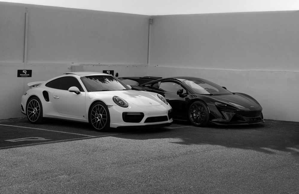 Porsche and McLaren cars at Raceroms performance tuning workshop